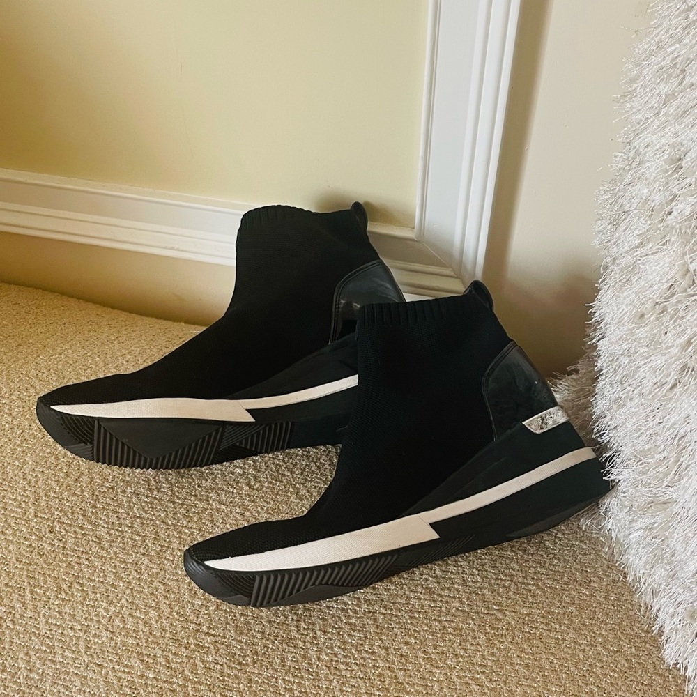 Michael Kors slip on sneakers size 10 M and fits 9.5 also